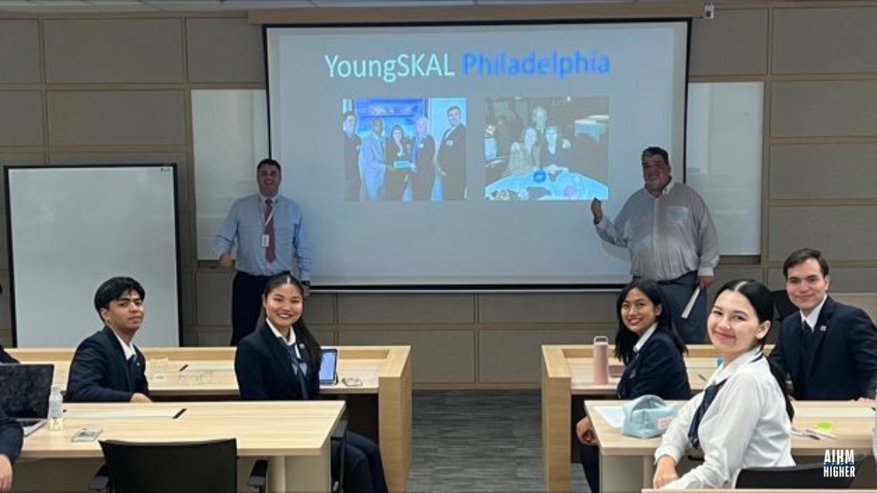 AIHM Hospitality student took a photo with the guest speaker after the class end
